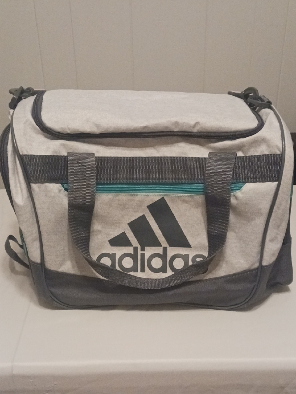 adidas Gray Duffel Bag with Teal Zip Accent